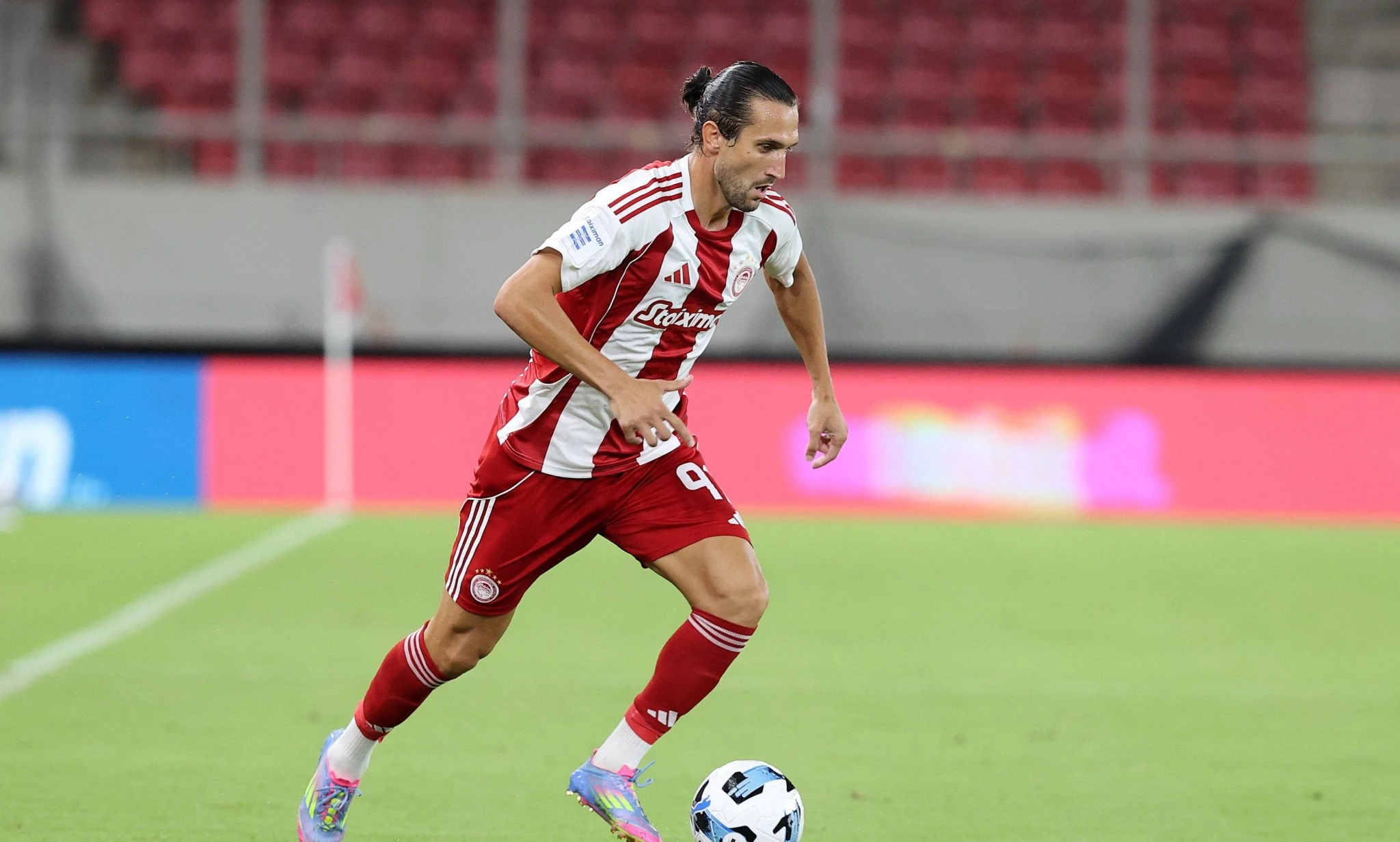 Ο Γιουσούφ Γιαζίτζι σε αγώνα του Ολυμπιακού / Πηγή: Intime