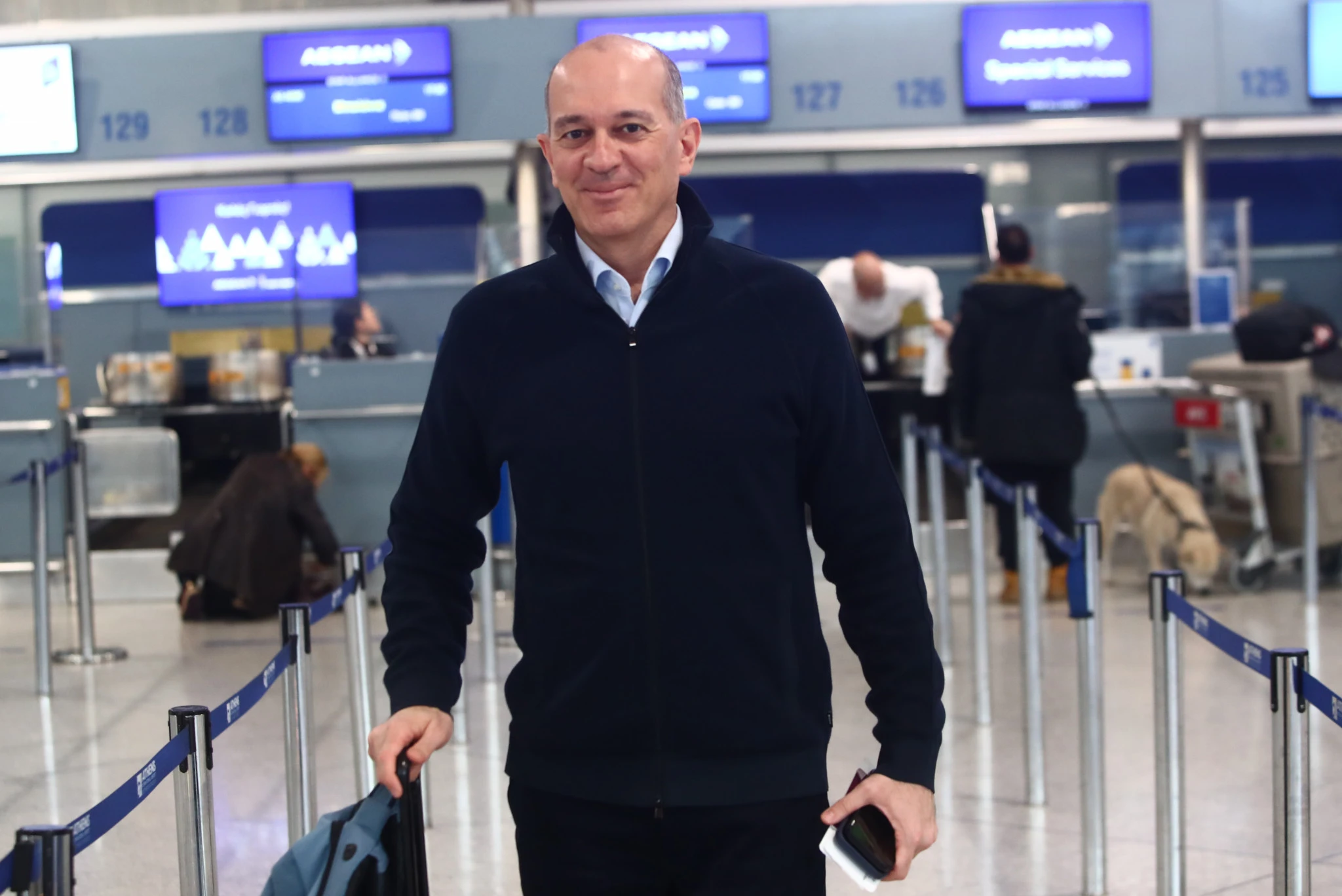 O Πρόεδρος του Ολυμπιακου στη αναχώρηση για την Μπολόνια / πηγή: eurokinissi